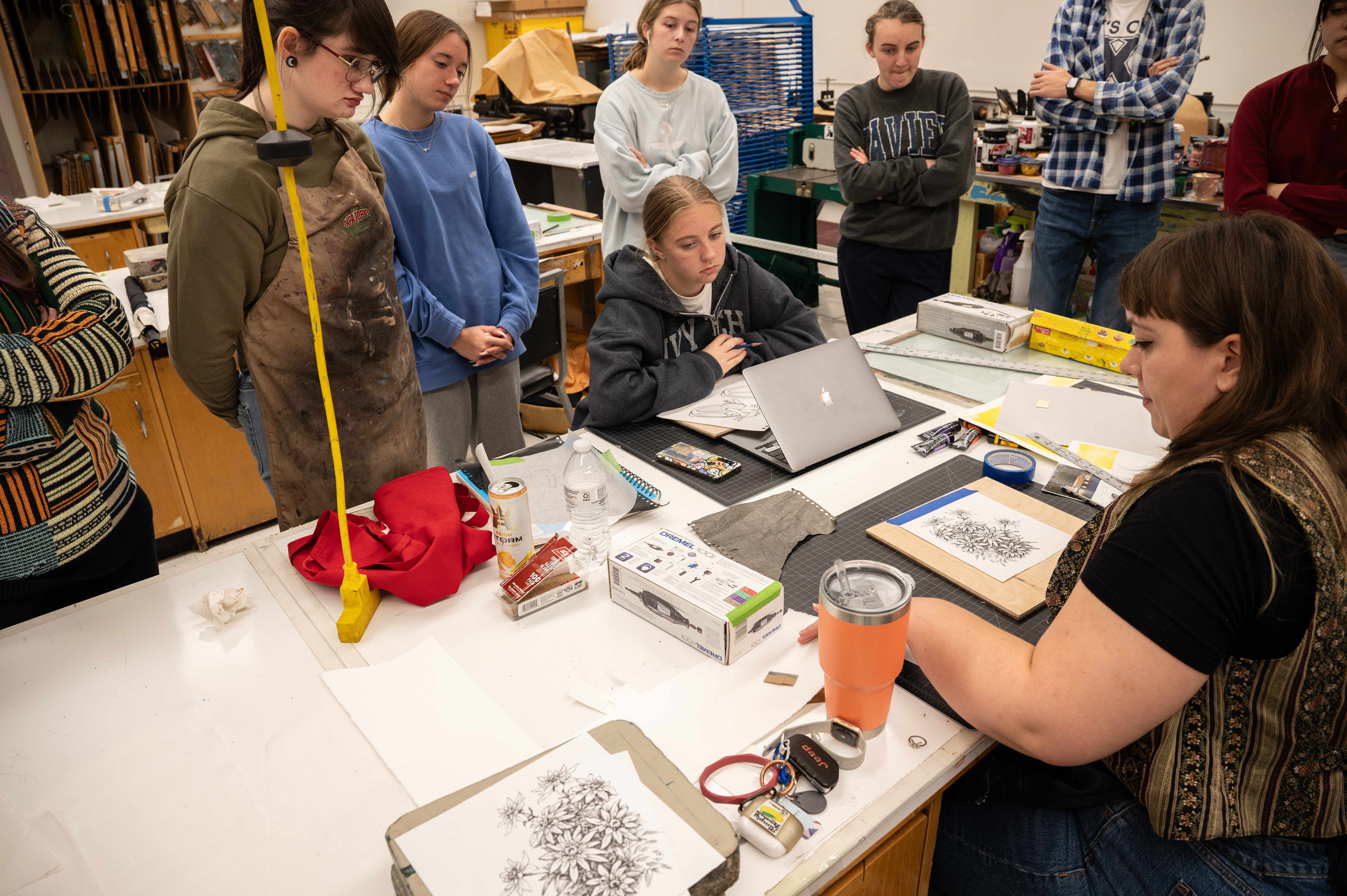 students watching print making