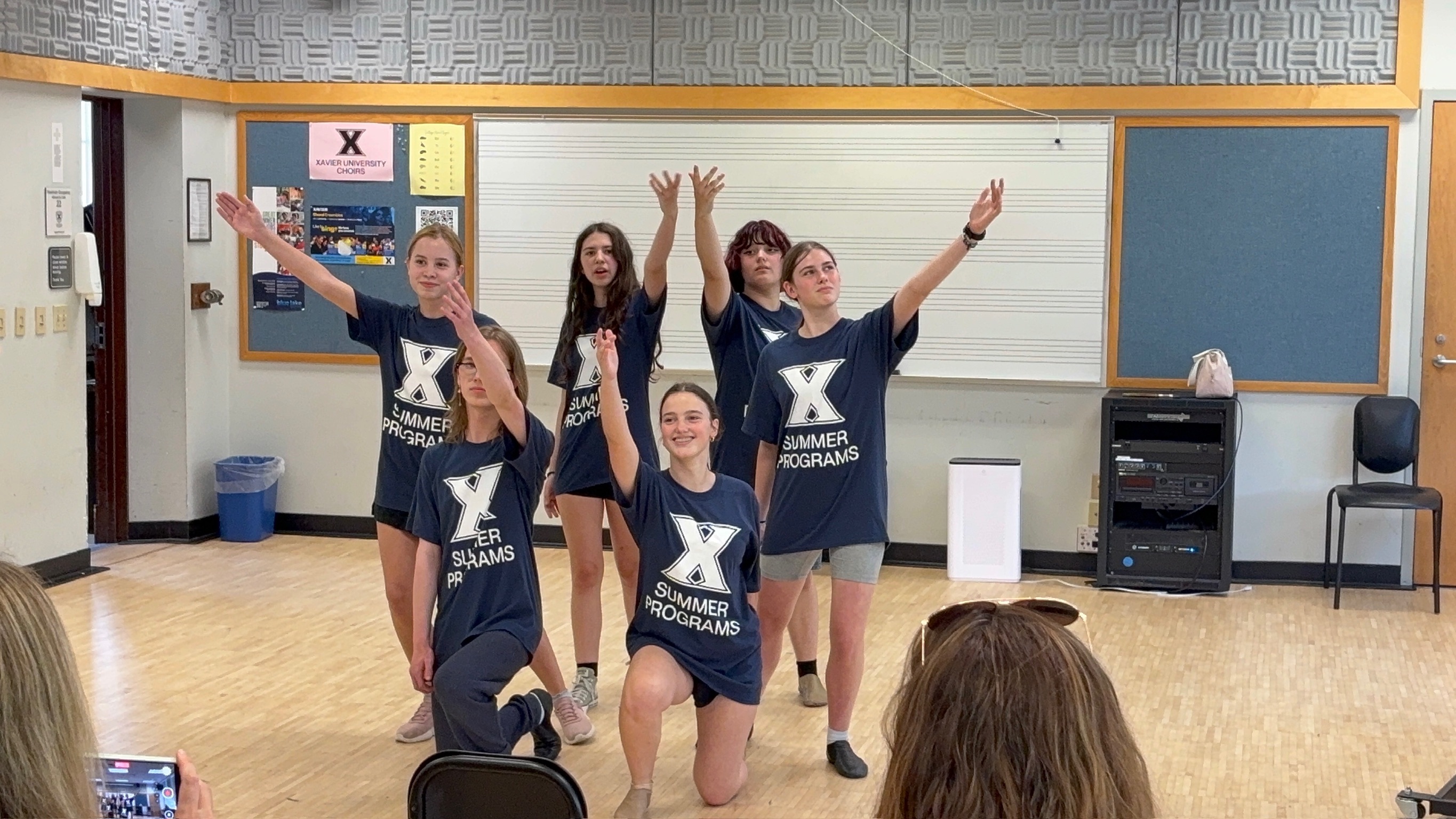 6 high school students performing