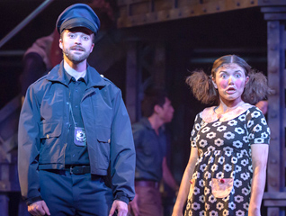 Two students in the theatre major on stage