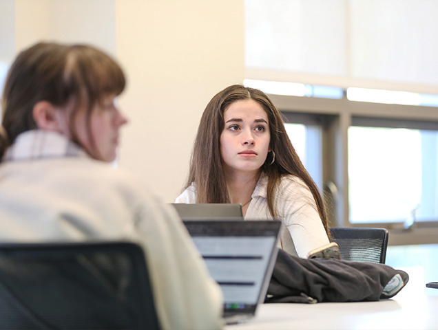 Students in the Theology major learning from Theology program alumni