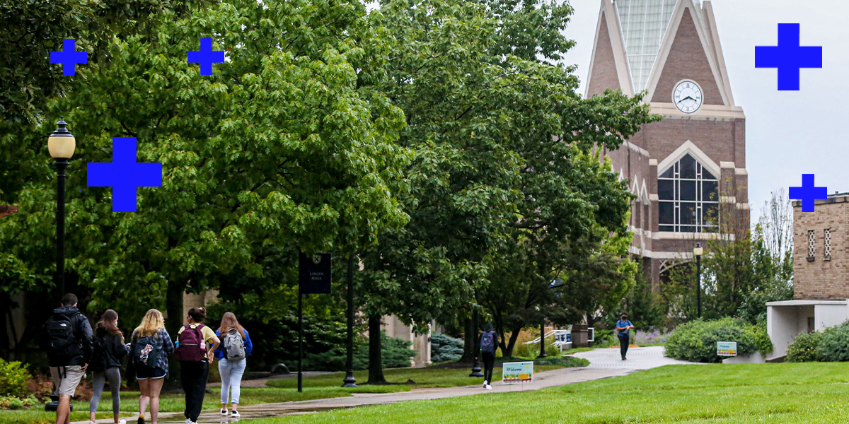 A group of Xavier students walking towards Gallagher Student Center.